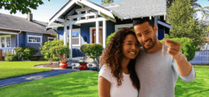 Couple with keys to new home
